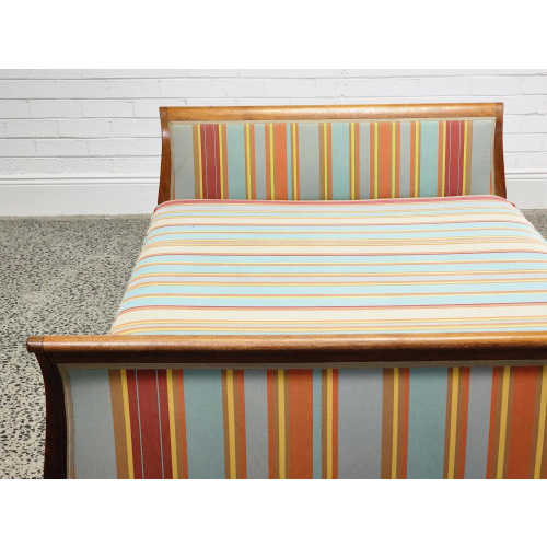 Louis XVI style carved timber daybed with colourful striped upholstery